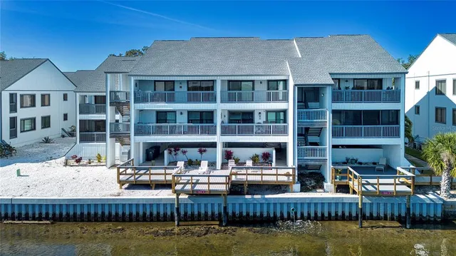 a view of pool with outdoor seating