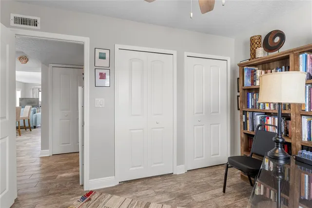 a view of a swimming pool with a patio