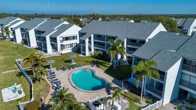 a sign that is sitting in front of a house