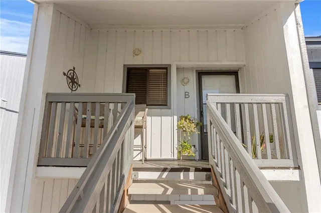 a view of an entryway with staircase