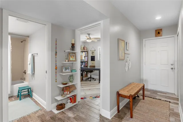a view of a livingroom with furniture and a wooden floor