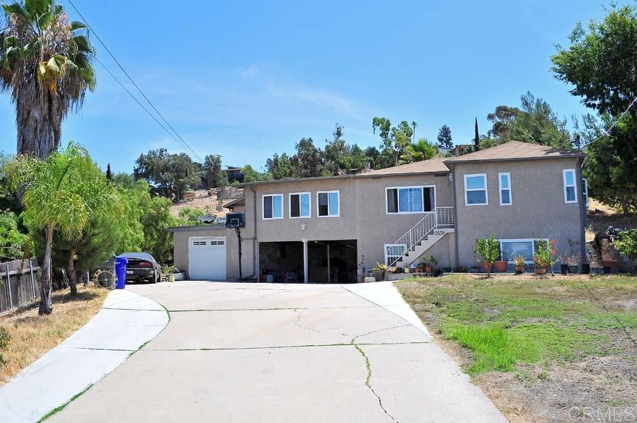 2839 Helix Street Spring Valley, CA 91977 - Photo 1 of 13 This is the main driveway -- leading to garage, carport, and basement.