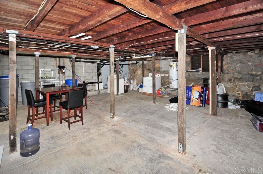 2839 Helix Street Spring Valley, CA 91977 - Photo 11 of 13 This is the basement. Very large and can be used for workshop, storage, etc. Laundry hook-ups and water heater are here. Easy access to plumbing and underside of house.