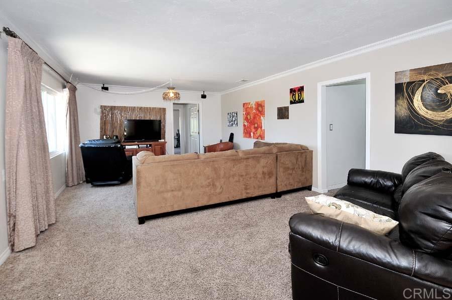 2839 Helix Street Spring Valley, CA 91977 - Photo 3 of 13 Looking into living room from dining area and kitchen.