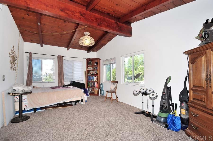 2839 Helix Street Spring Valley, CA 91977 - Photo 8 of 13 This large room is off the master suite and could be exercise/media/family/project room.