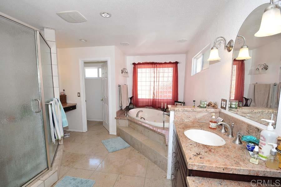 2839 Helix Street Spring Valley, CA 91977 - Photo 9 of 13 Master bathroom has upgrades and lots of room, but needs deep cleaning and a tune-up.