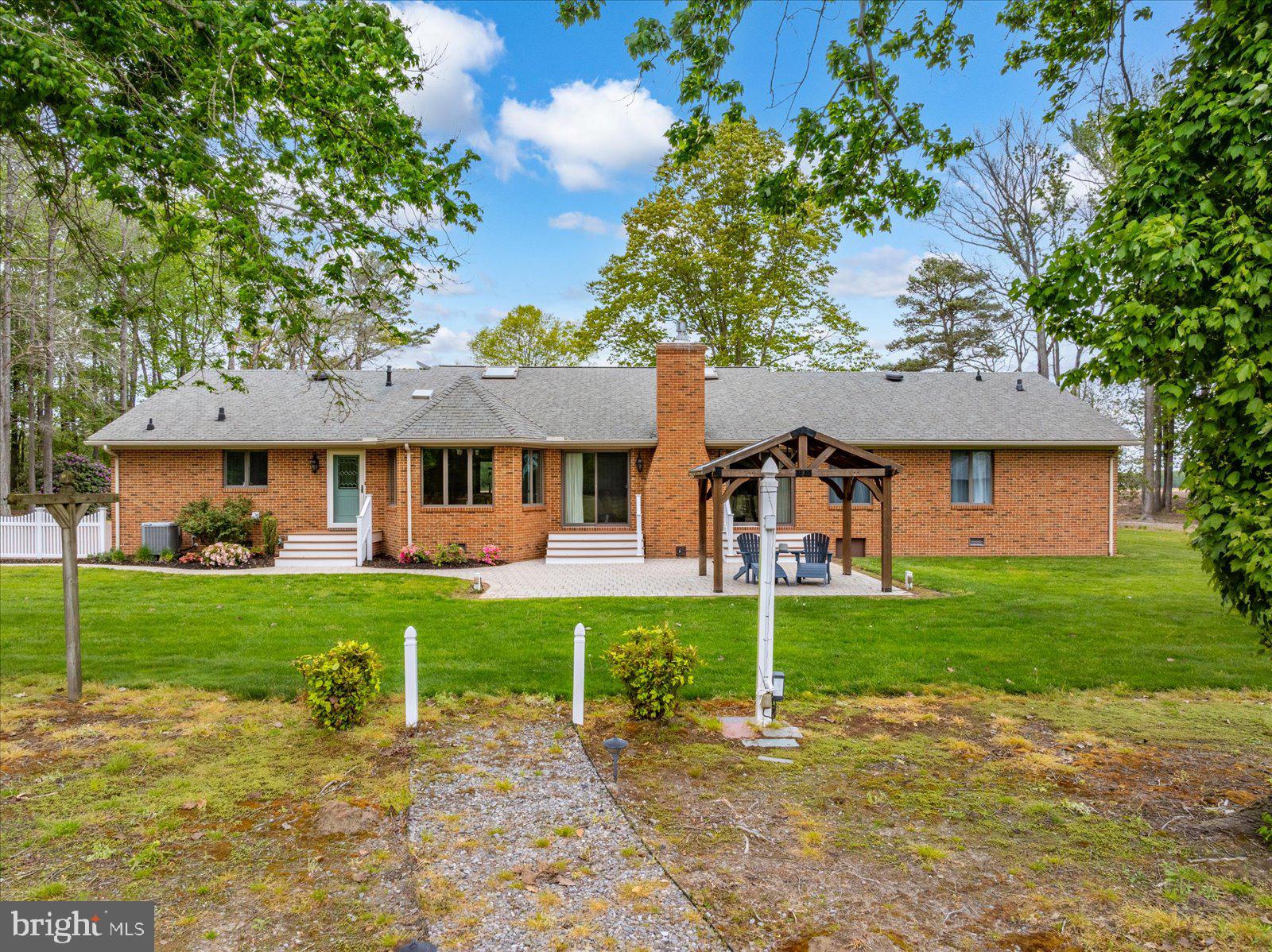 33915 Shockley Road Parsonsburg, MD 21849 - Photo 12 of 125 Charming brick home with lush greenery.