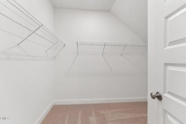 a view of small space with racks on the wall
