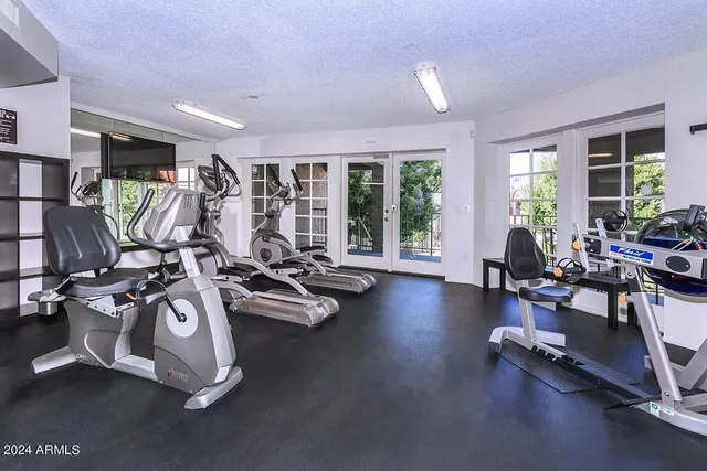 a view of a room with gym equipment