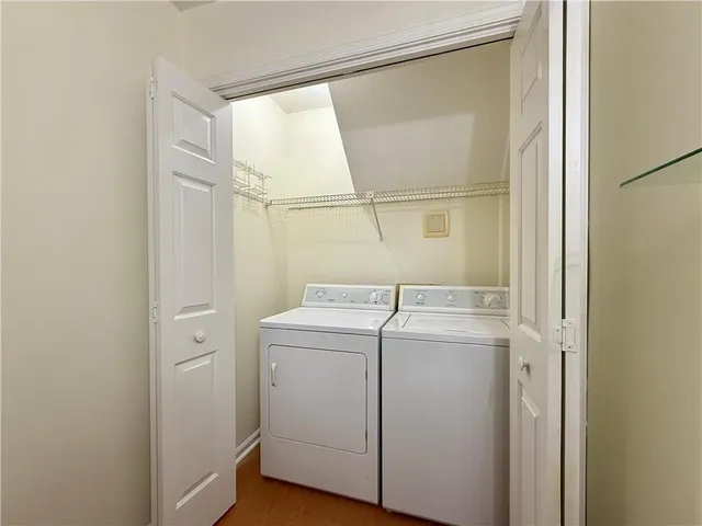 a utility room with dryer and washer