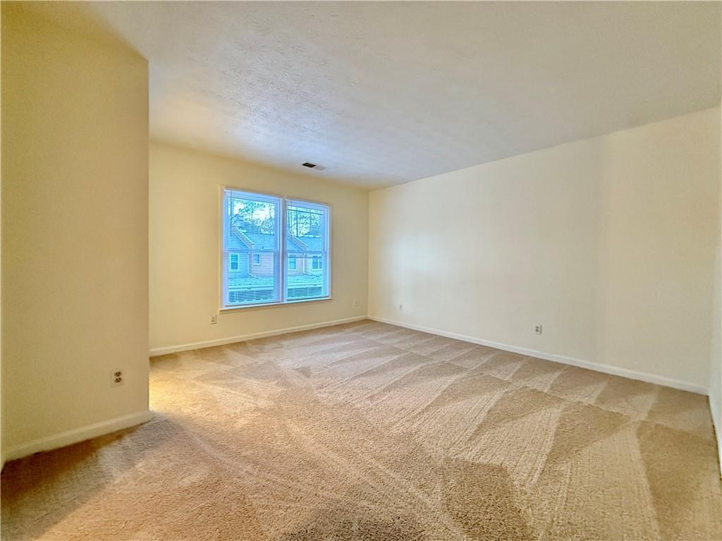 3533 Mulberry Way Duluth, GA 30096 - Photo 28 of 29 an empty room with windows