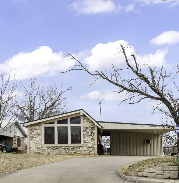 505 Alexander Road Stephenville, TX 76401 - Photo 1 of 29 a front view of a house with a yard