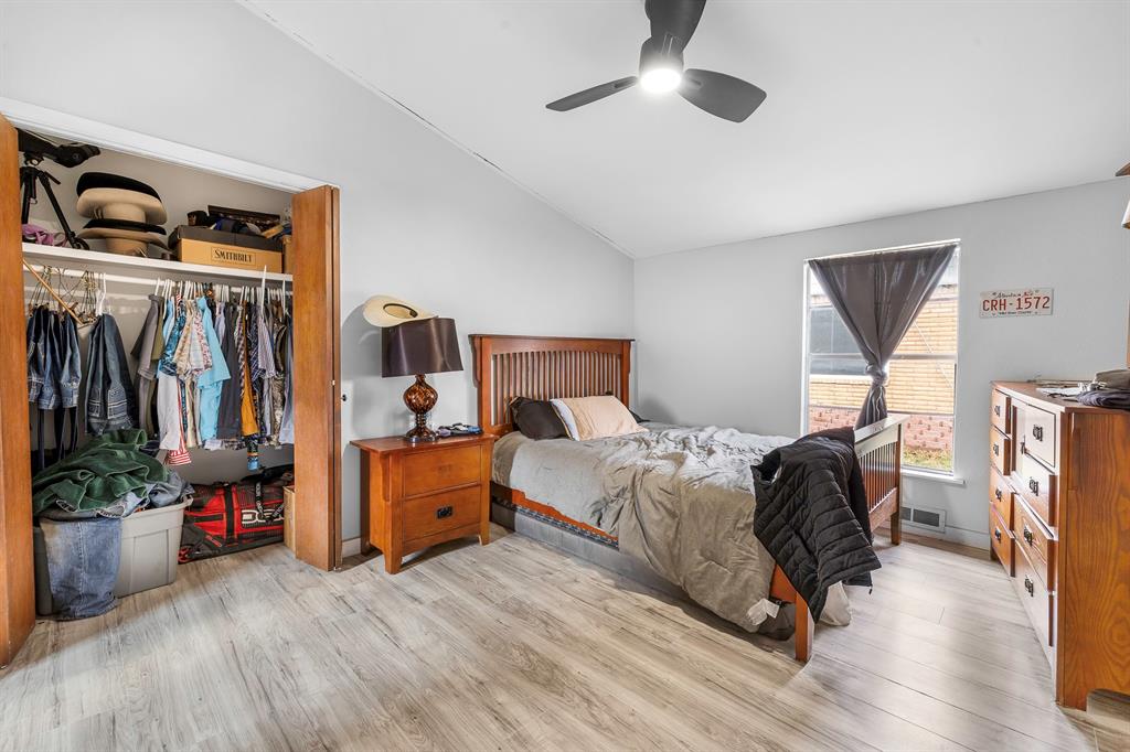 505 Alexander Road Stephenville, TX 76401 - Photo 14 of 29 a bedroom with furniture and a window