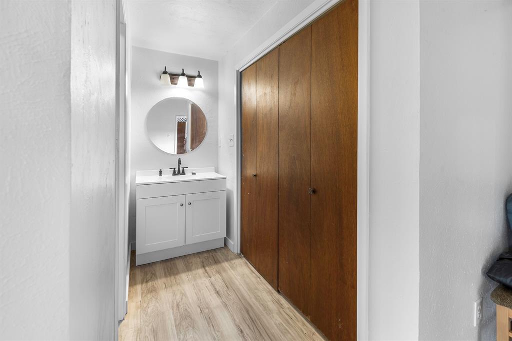 505 Alexander Road Stephenville, TX 76401 - Photo 19 of 29 a bathroom with a sink and a mirror