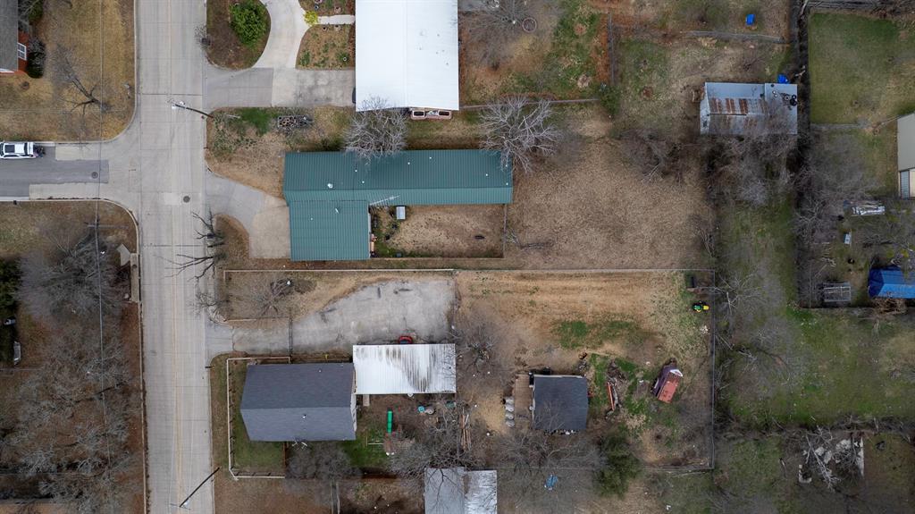 505 Alexander Road Stephenville, TX 76401 - Photo 24 of 29 a aerial view of a house with a yard