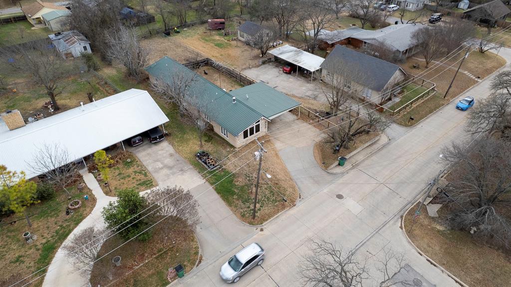 505 Alexander Road Stephenville, TX 76401 - Photo 25 of 29 an aerial view of a house with a yard