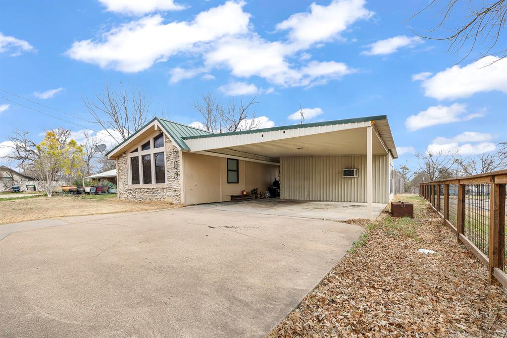 505 Alexander Road Stephenville, TX 76401 - Photo 4 of 29 a view of a house with a patio