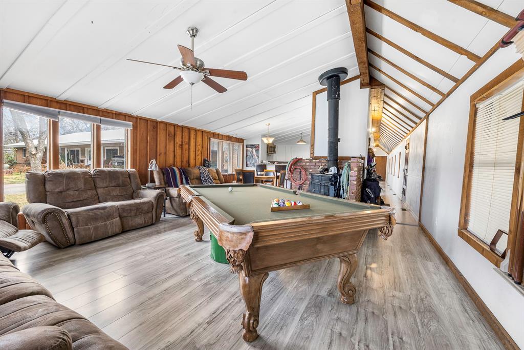 505 Alexander Road Stephenville, TX 76401 - Photo 6 of 29 a living room with furniture and a large window