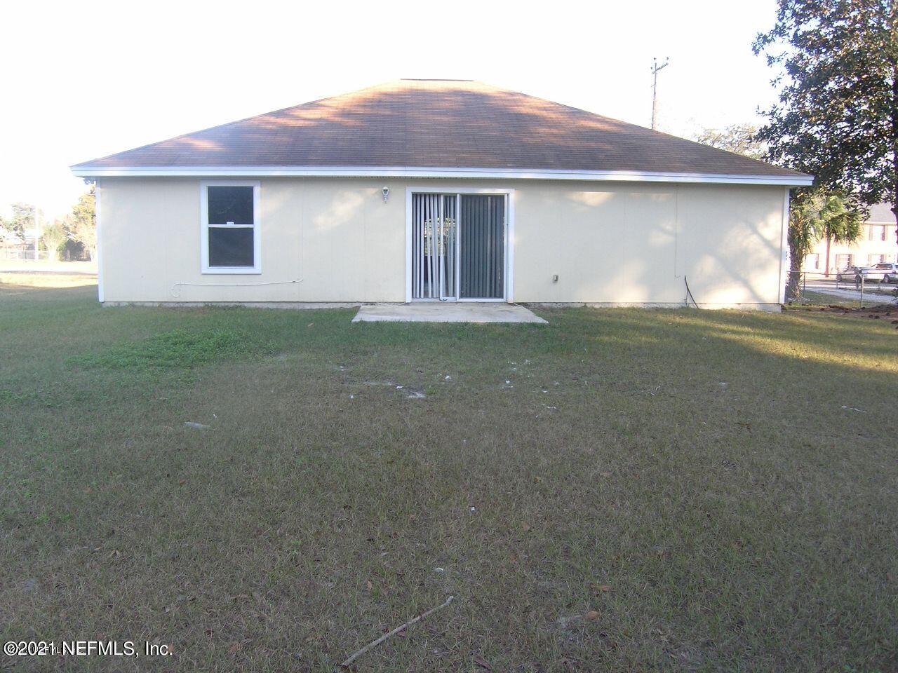 7290 Wheat Road Jacksonville, FL 32244 - Photo 4 of 4 a view of outdoor space and yard