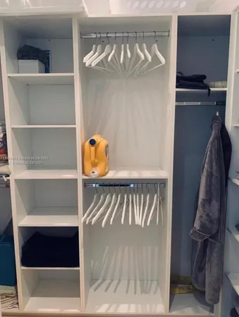 a view of staircase with a rug