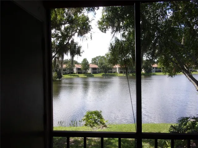 a view of a lake from a balcony