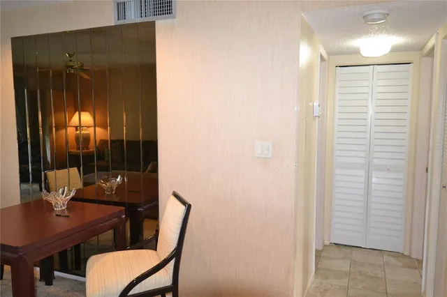 a room with a couch and a flat screen tv