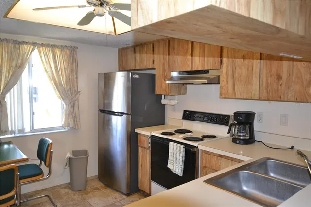 a bedroom with a bed and a lamp