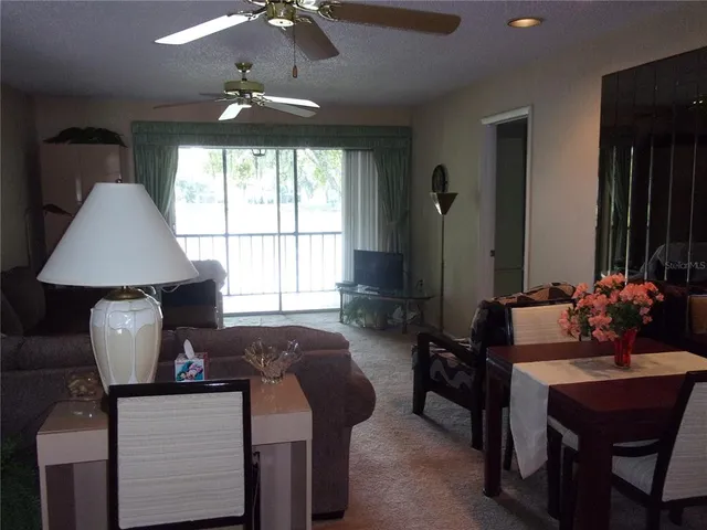 a view of workspace with furniture and window