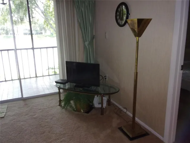 a bathroom with a shower a toilet and a sink