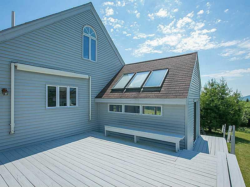 771 Camden Road Hope, ME 04847 - Photo 7 of 27 Exterior Front. Great deck with SW...