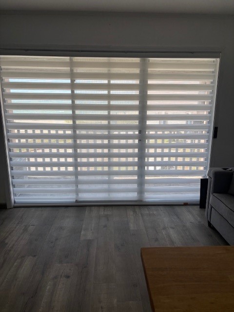 3938 Surfside Boulevard, Unit 2106 Corpus Christi, TX 78402 - Photo 14 of 21 a view of a room that has a large window in it