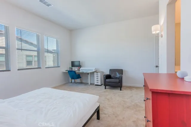 a bathroom with a double vanity sink and mirror