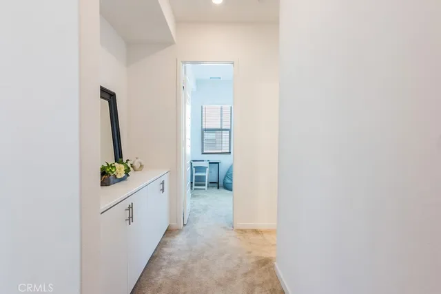 a room with a chair and a window