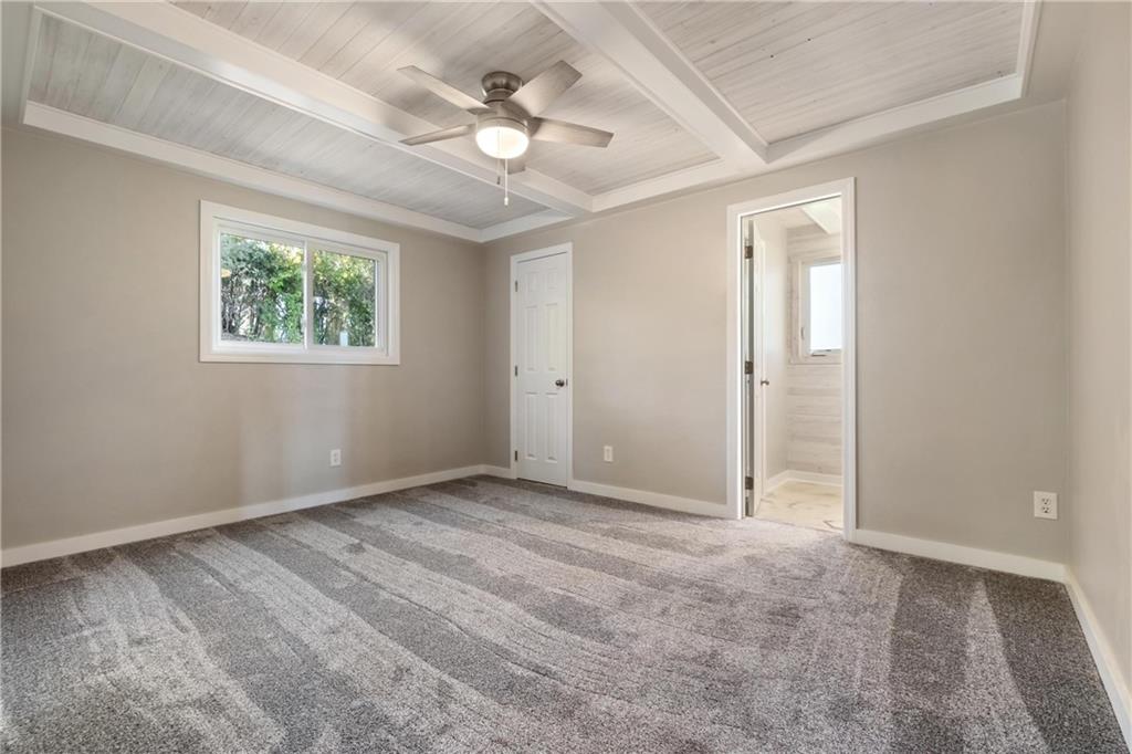 4786 Doyle Road Pittsburgh, PA 15227 - Photo 14 of 31 an empty room with windows and fan