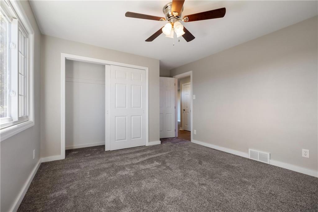 4786 Doyle Road Pittsburgh, PA 15227 - Photo 20 of 31 an empty room with chandelier fan