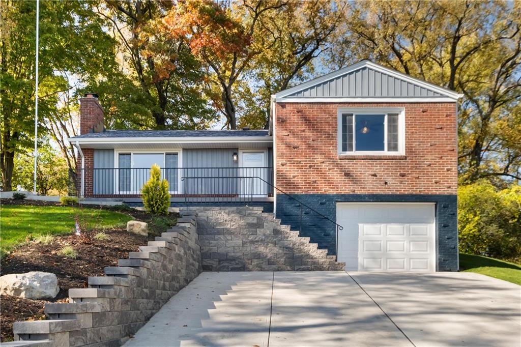 4786 Doyle Road Pittsburgh, PA 15227 - Photo 2 of 31 a front view of a house with garden