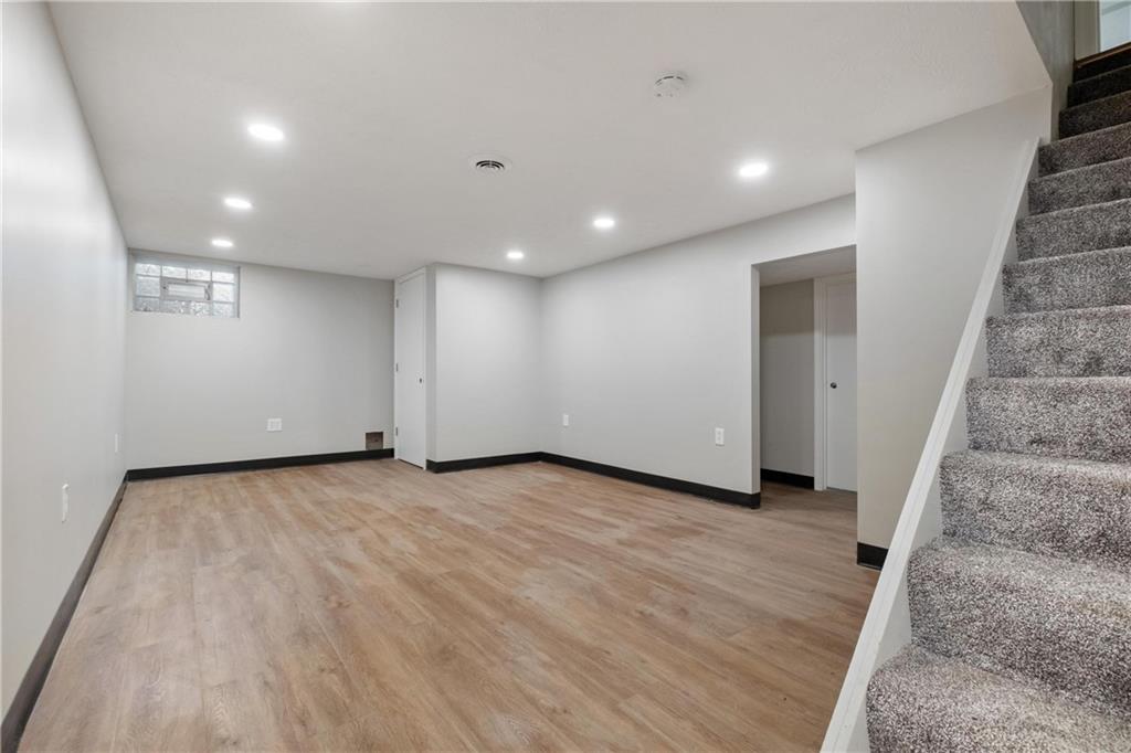 4786 Doyle Road Pittsburgh, PA 15227 - Photo 25 of 31 an empty room with wooden floor and entryway