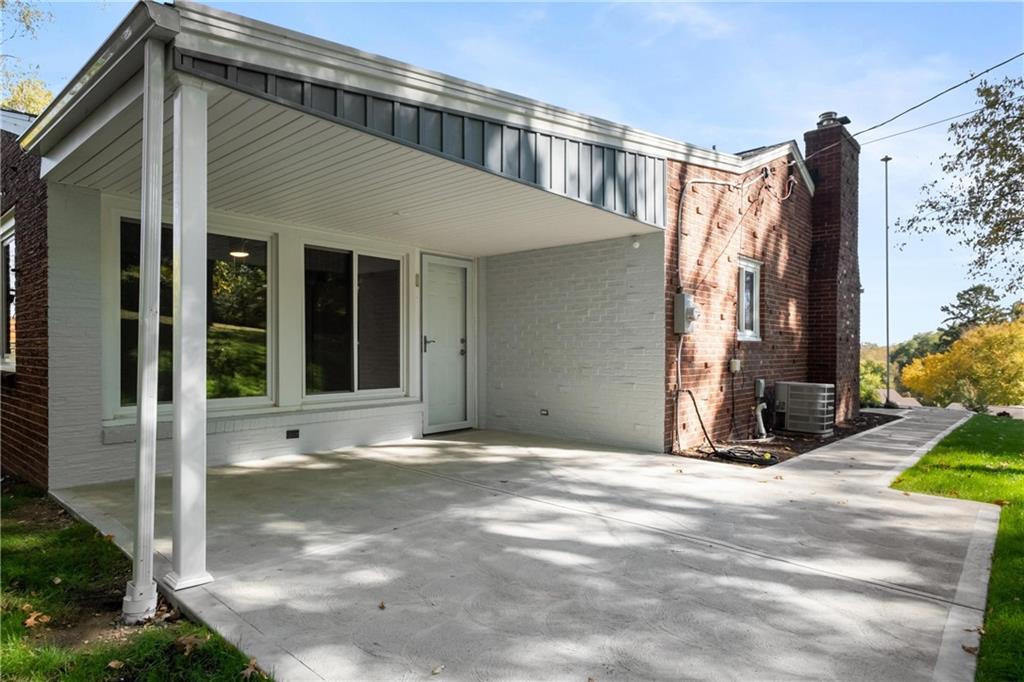 4786 Doyle Road Pittsburgh, PA 15227 - Photo 26 of 31 a view of a house with a backyard