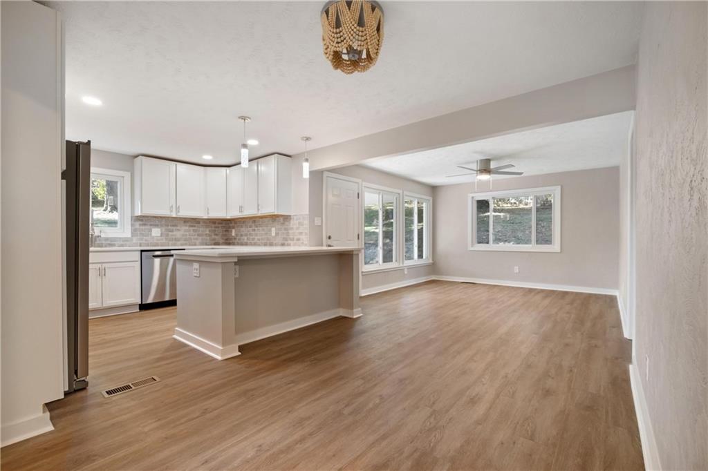 4786 Doyle Road Pittsburgh, PA 15227 - Photo 8 of 31 a kitchen with a refrigerator and a sink
