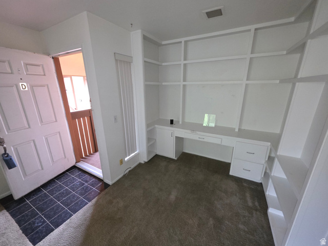 6852 Countrywoods Circle, Unit 5D Midvale, UT 84047 - Photo 33 of 50 Potential 2nd bedroom - would require HOA approval. Tile entry.