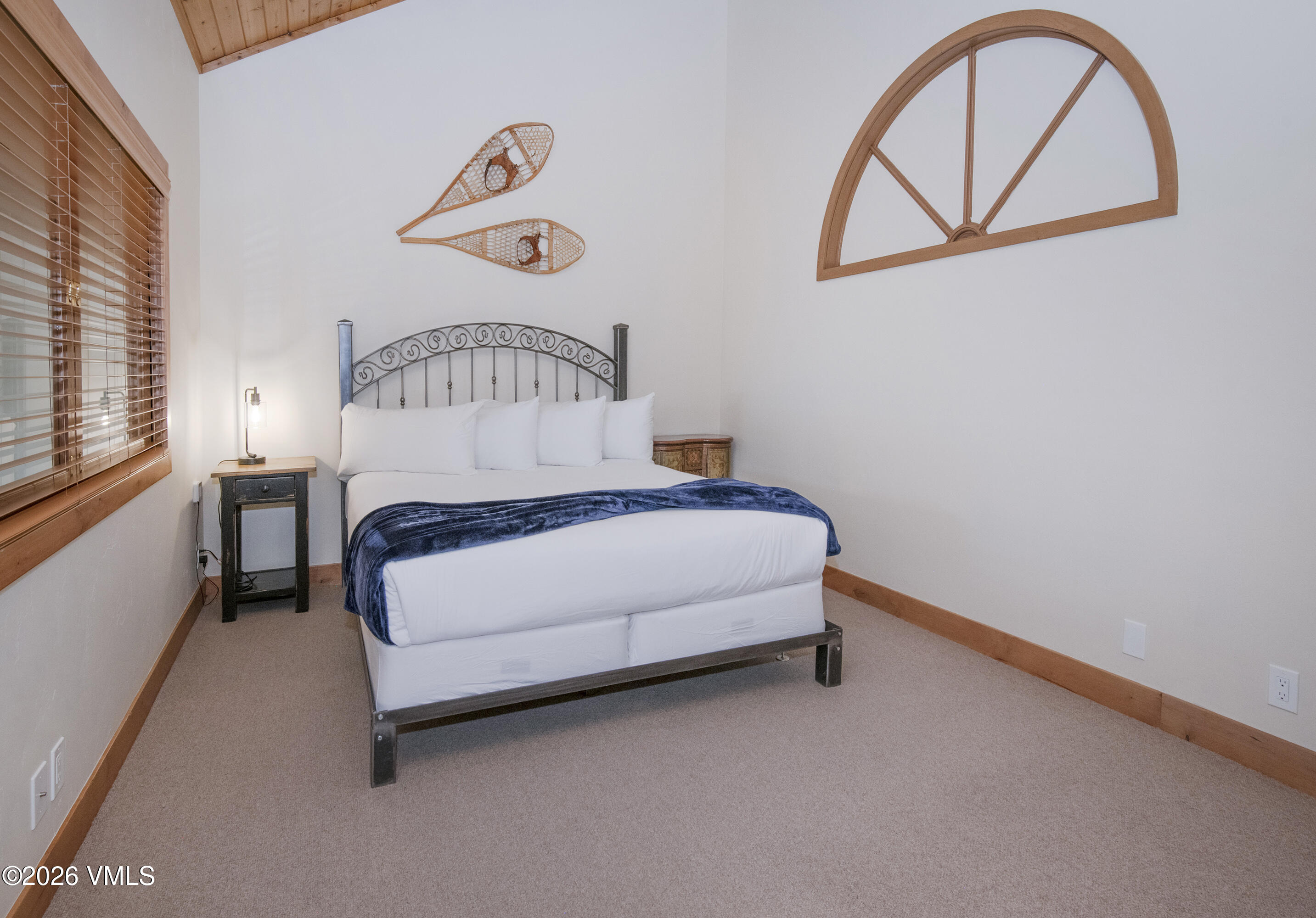 1206 Village Road, Unit B307 Beaver Creek, CO 81620 - Photo 12 of 20 a bedroom with a bed and a window