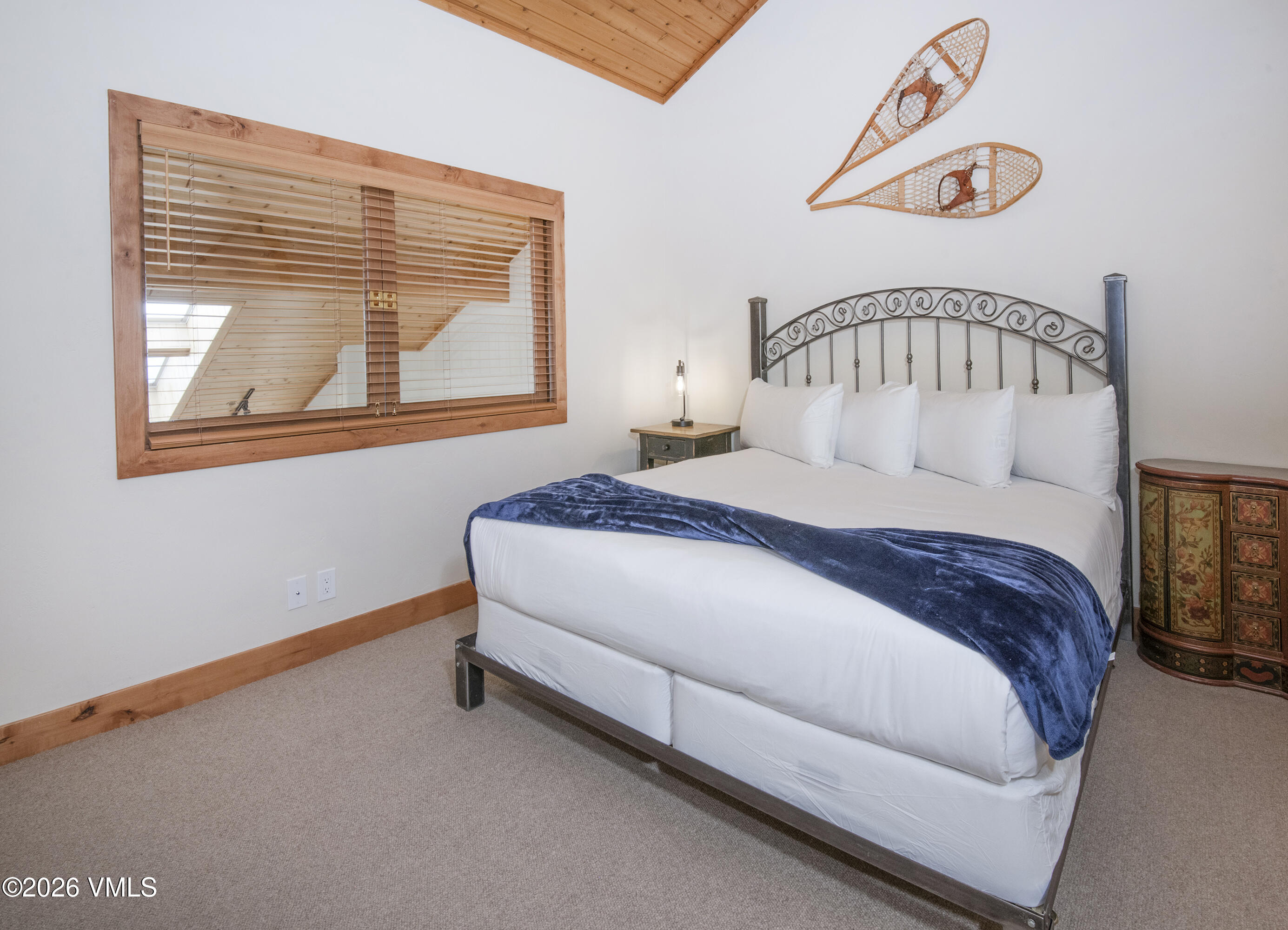 1206 Village Road, Unit B307 Beaver Creek, CO 81620 - Photo 13 of 20 a bedroom with a bed and window