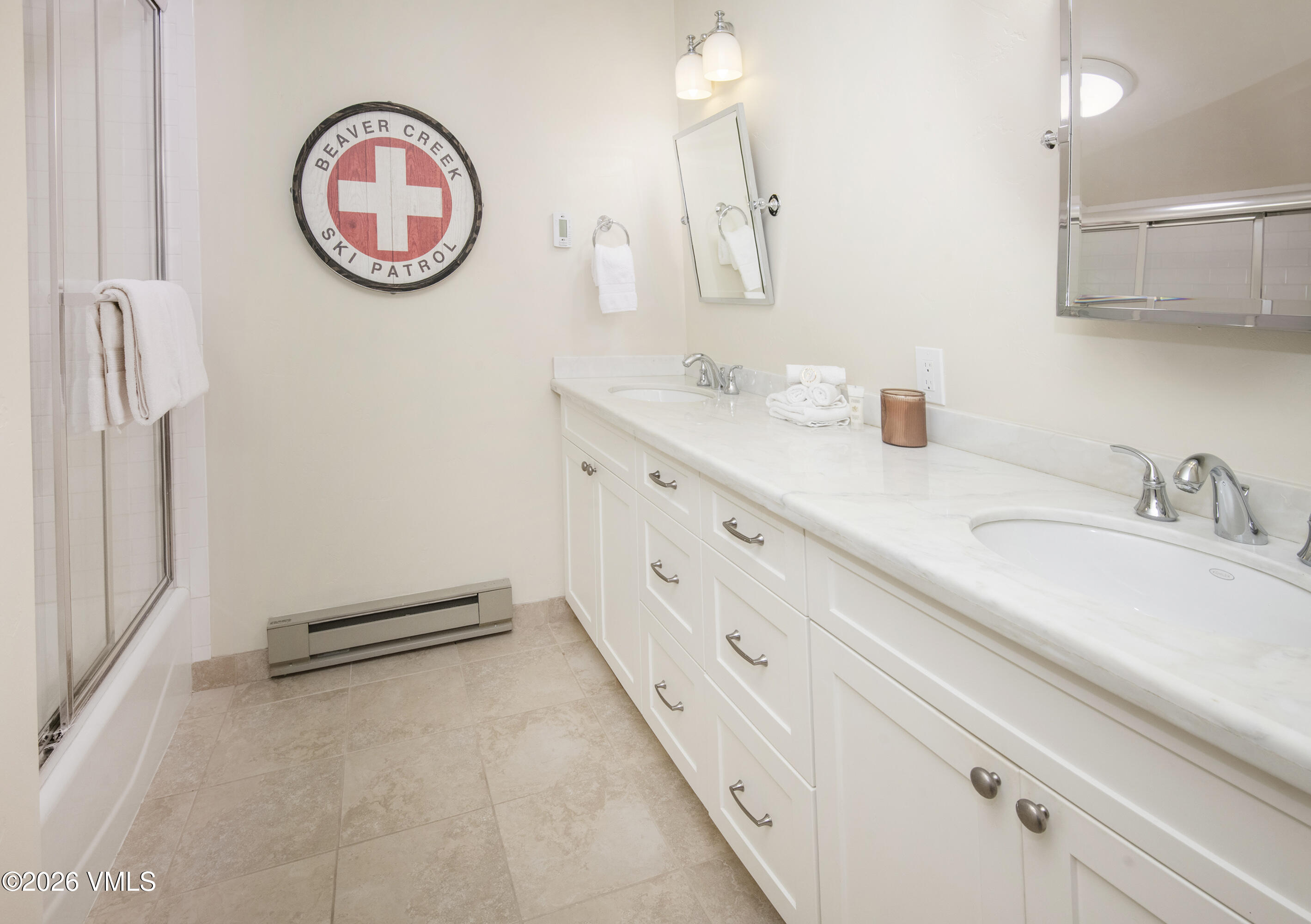 1206 Village Road, Unit B307 Beaver Creek, CO 81620 - Photo 14 of 20 a bathroom with cabinets and a sink