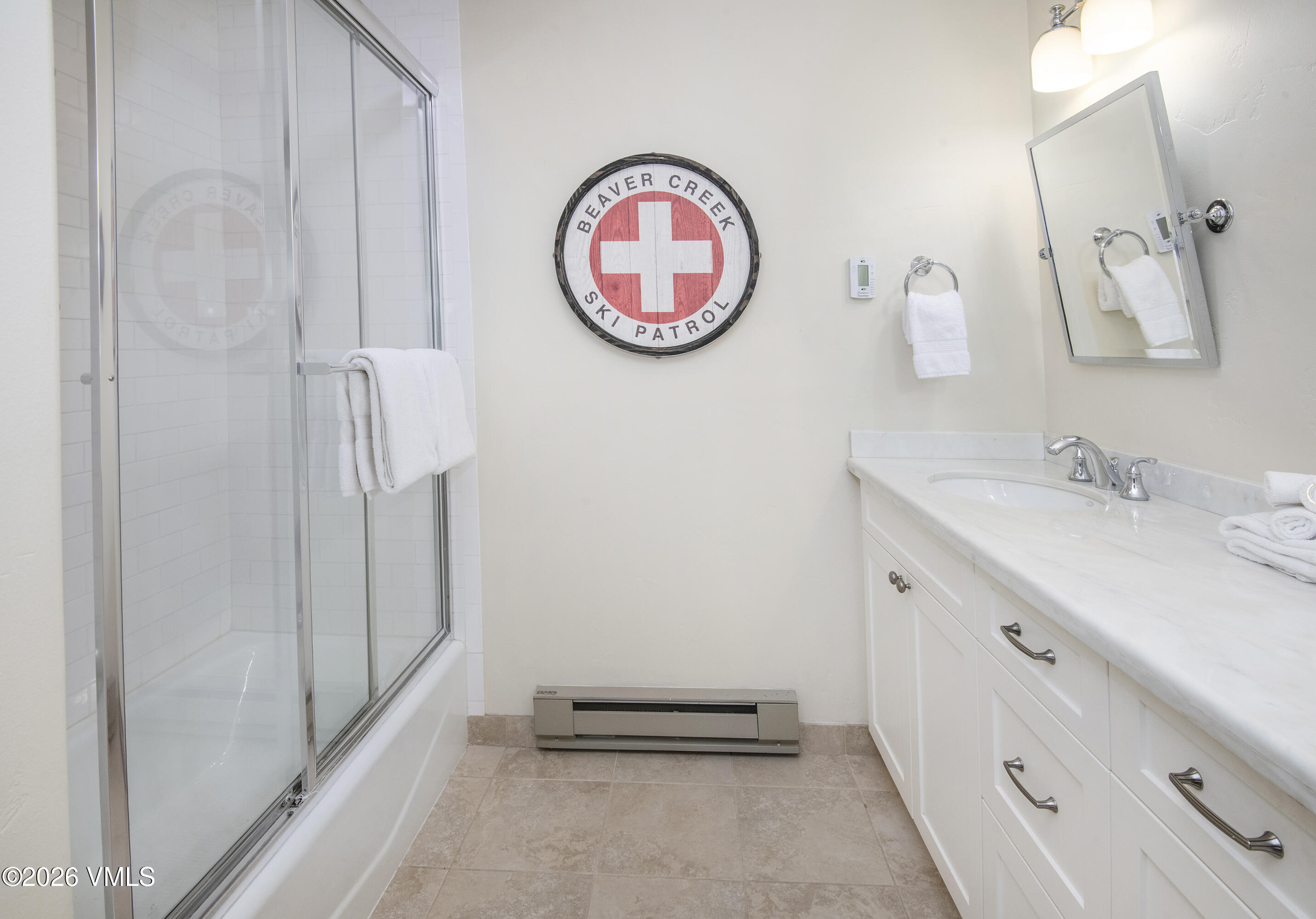 1206 Village Road, Unit B307 Beaver Creek, CO 81620 - Photo 15 of 20 a bathroom with a sink and a mirror