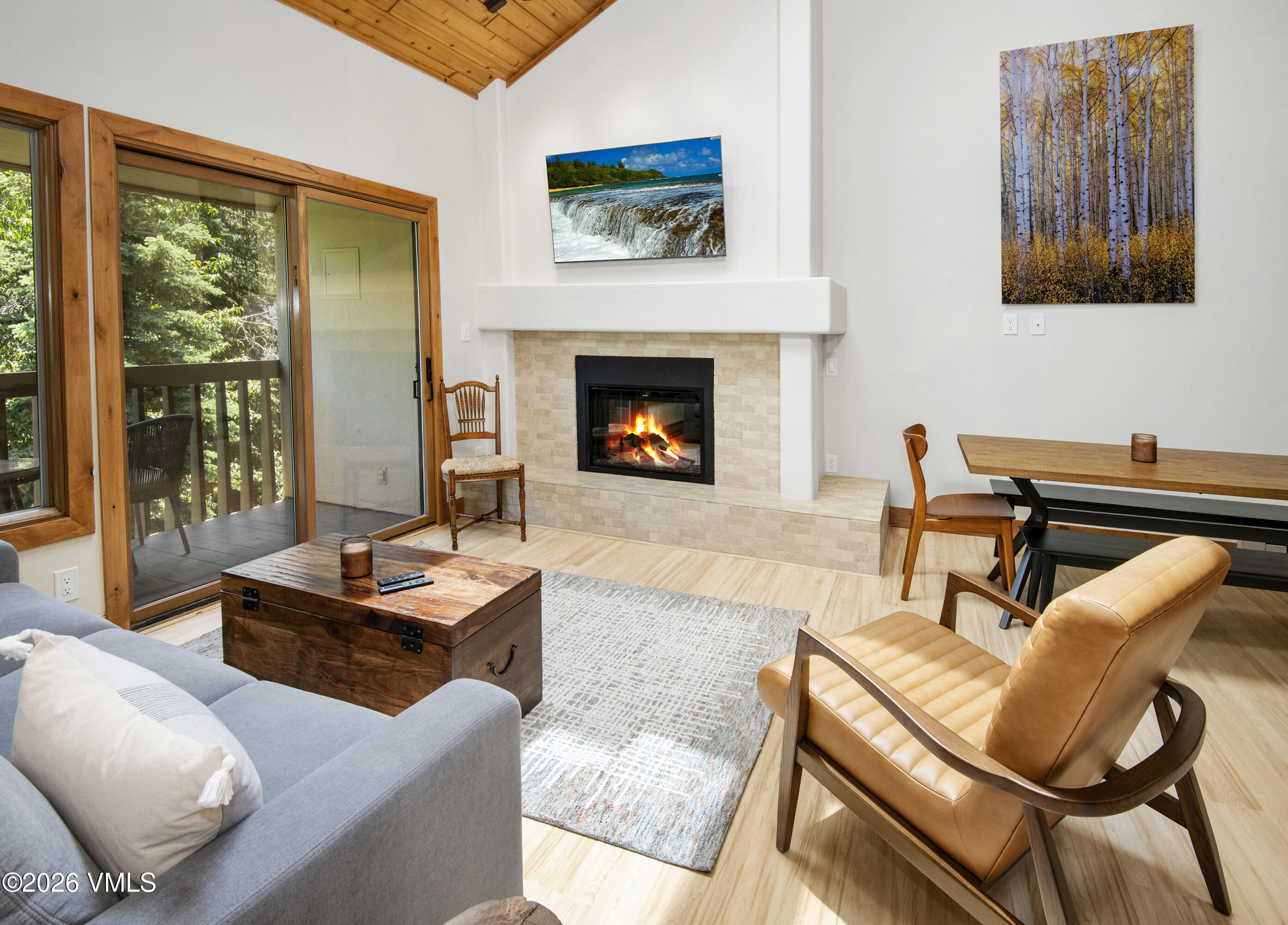 1206 Village Road, Unit B307 Beaver Creek, CO 81620 - Photo 2 of 20 a living room with furniture and a fireplace