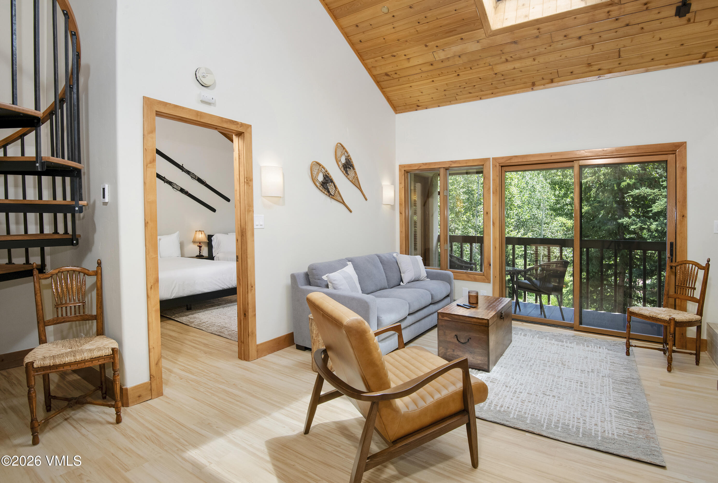 1206 Village Road, Unit B307 Beaver Creek, CO 81620 - Photo 6 of 20 a living room with furniture and a floor to ceiling window