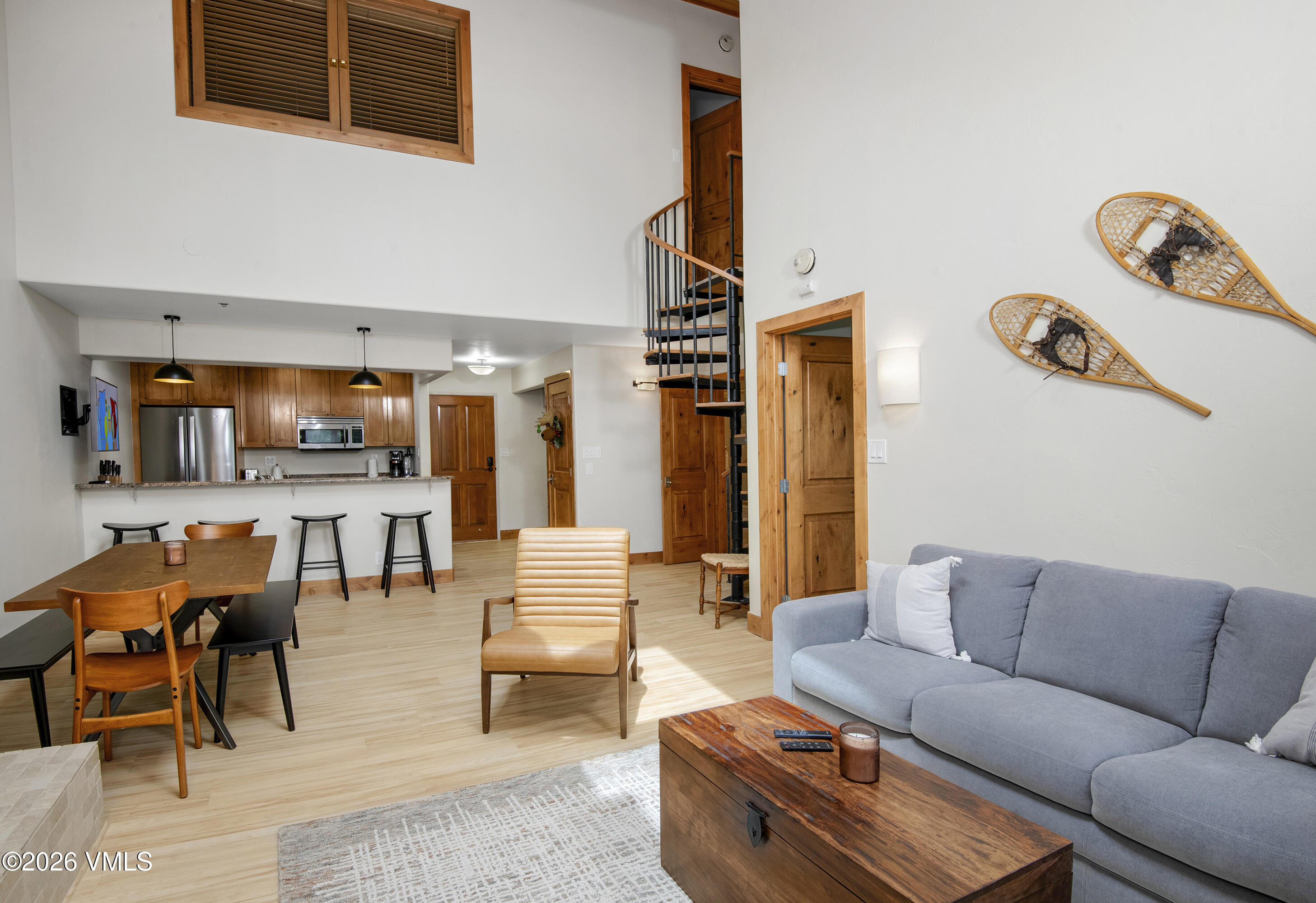 1206 Village Road, Unit B307 Beaver Creek, CO 81620 - Photo 7 of 20 a living room with furniture and wooden floor
