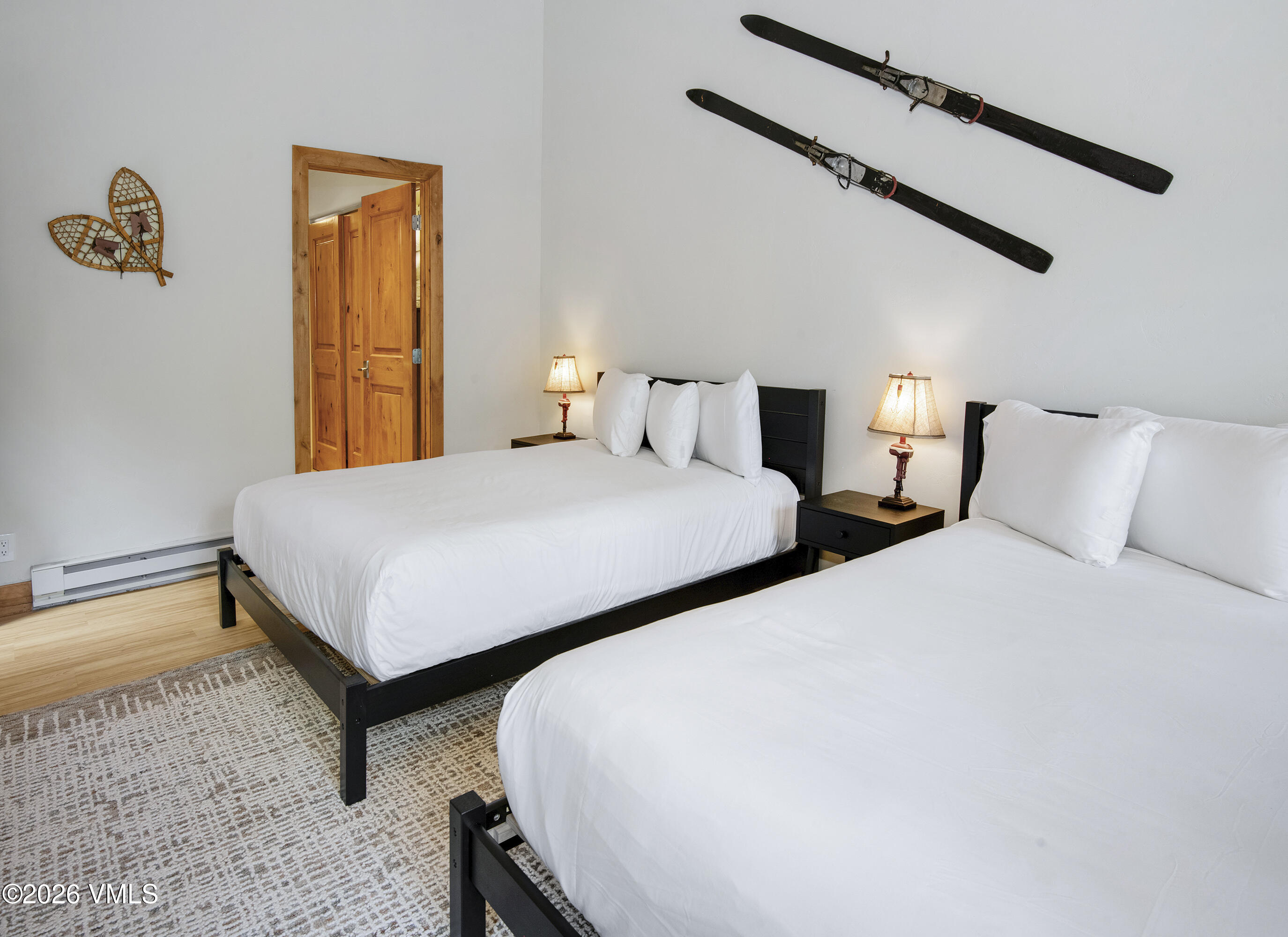 1206 Village Road, Unit B307 Beaver Creek, CO 81620 - Photo 10 of 20 a bedroom with bed and window