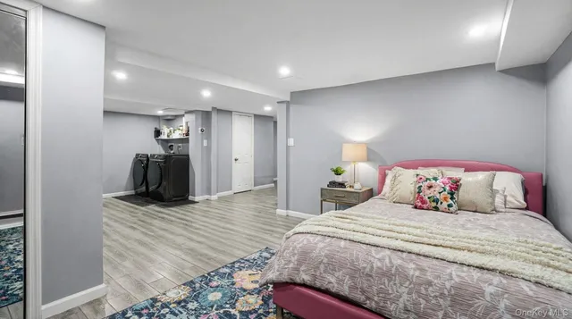 a bedroom with a bed and a walk in closet