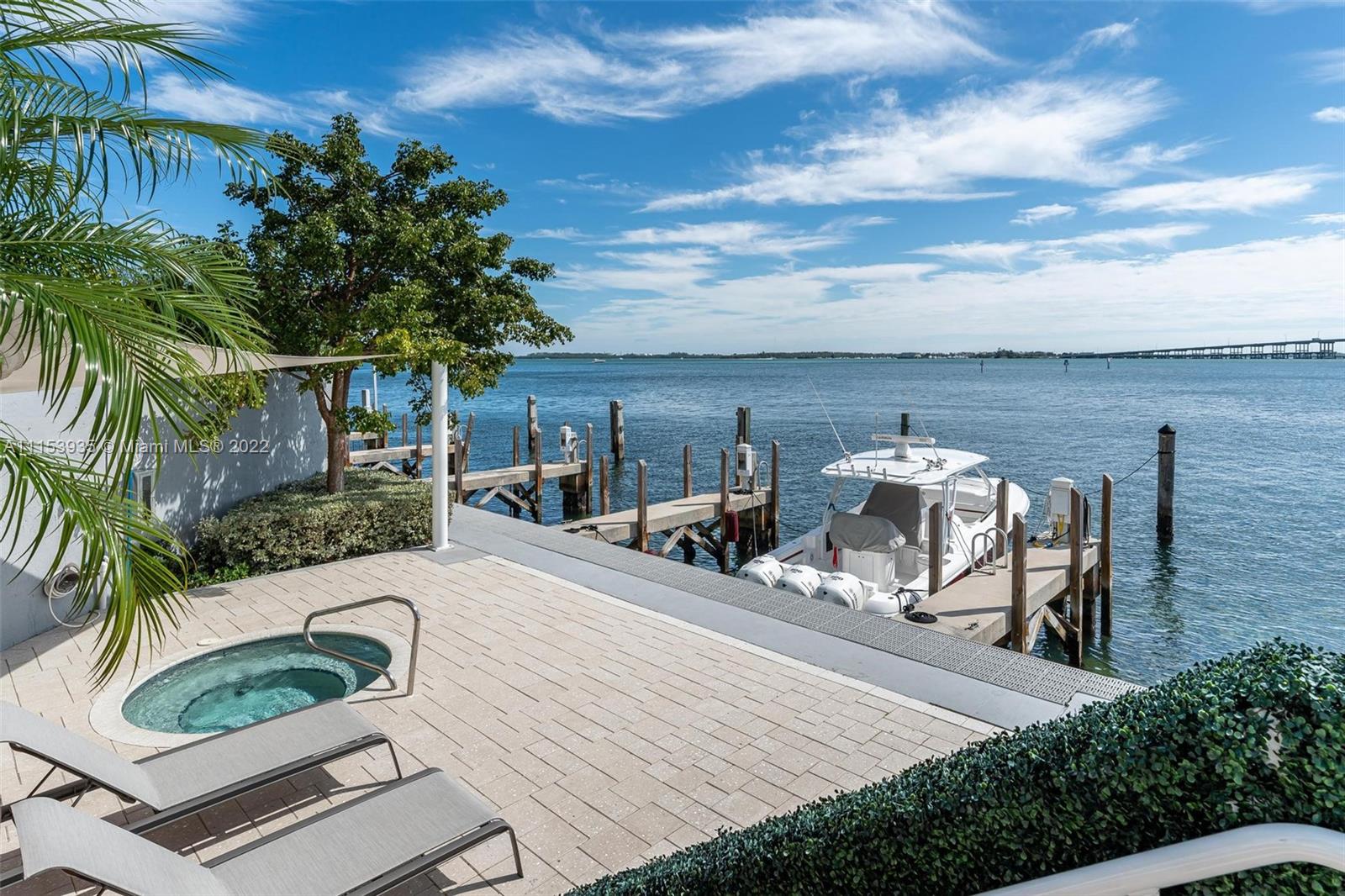 200 Southeast 15th Road, Unit 11H Miami, FL 33129 - Photo 3 of 20 a view of a backyard with sitting area